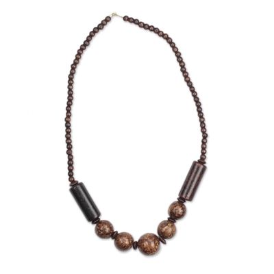 Handcrafted West African Wood Beaded Necklace with Brass Clasp | NOVICA