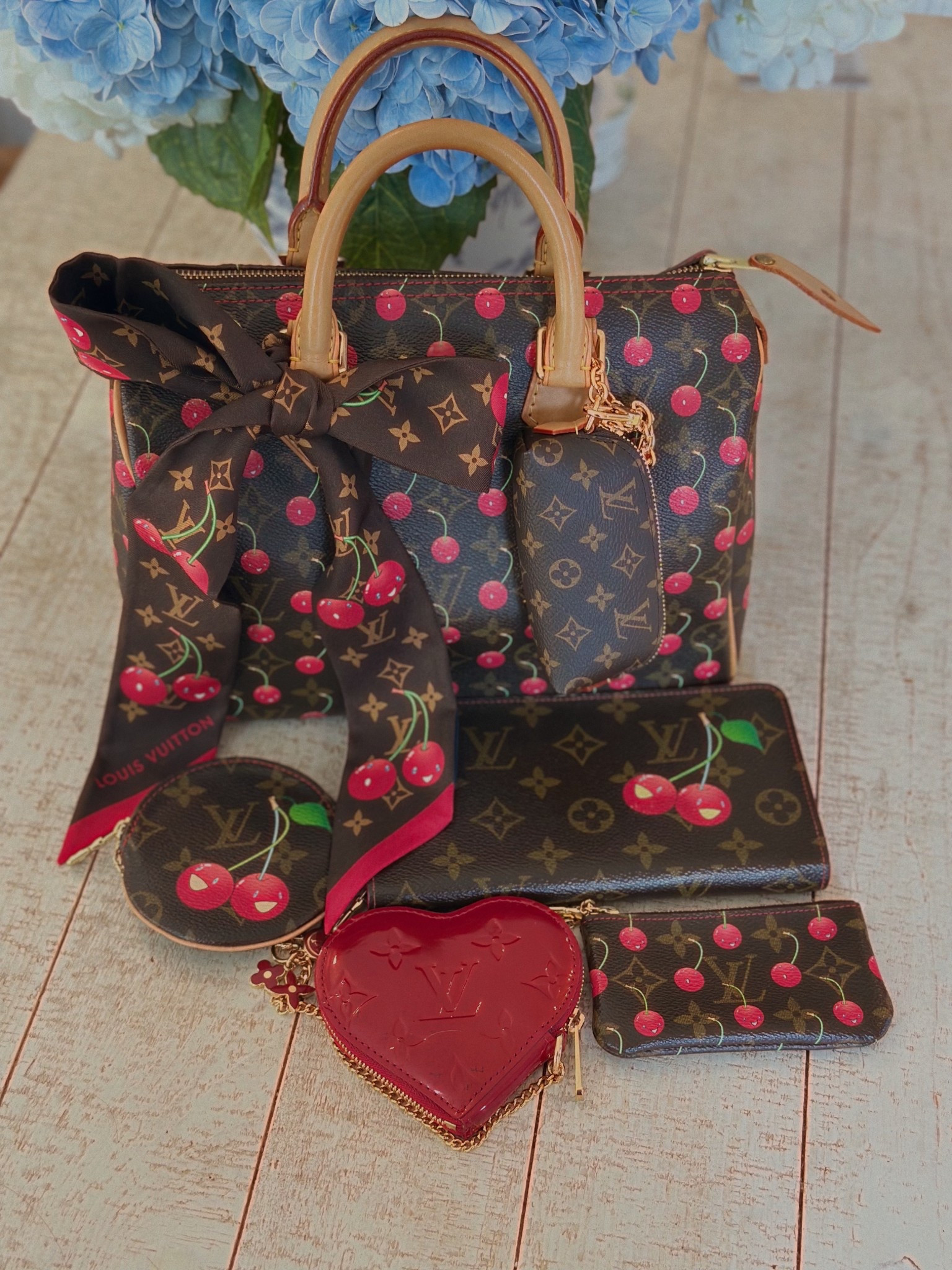 LV Murakami Cerises this monogram Monday. 

#LTKPetite #LTKSaleAlert #LTKOver40