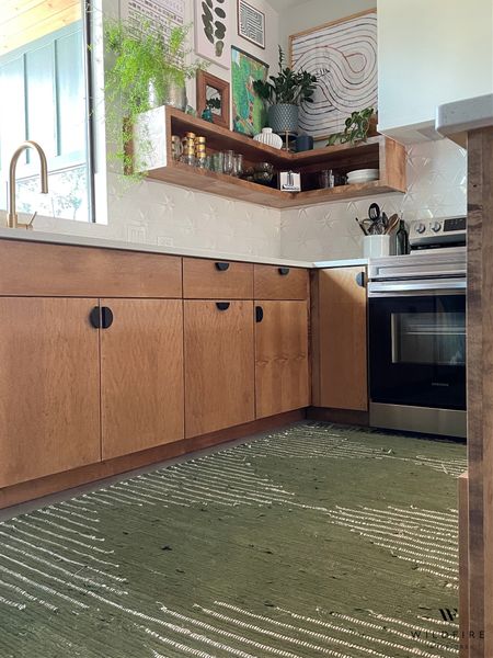 I don’t know about you, but I like having a rug in my kitchen. This one isn’t labeled as washable, but I’ve washed it multiple times and it hasn’t fallen apart. Also, it’s super pretty 😍 

#midcenturymodernkitchen #greenrug #kitchen rug #kitchendecor

#LTKhome