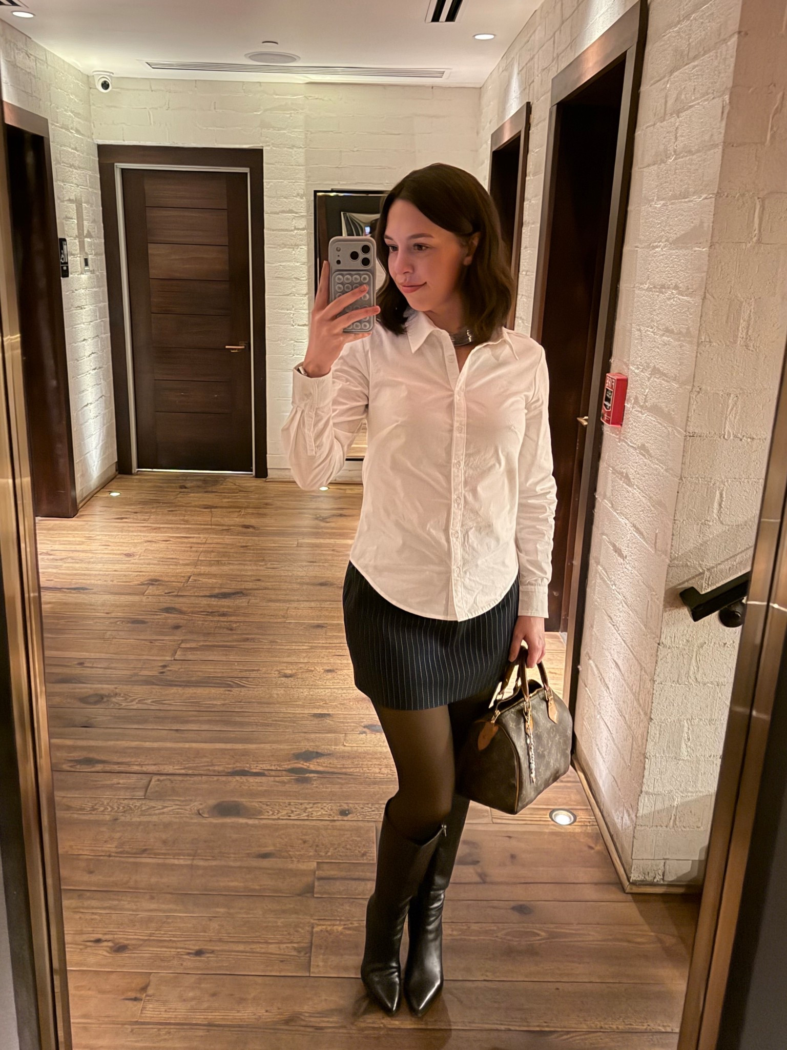 Dinner ootd 🍸 Wearing a small in the top, medium in the skort and a 7.5 in the boots. I half sized up for these boots!!!

#datenightoutfit #dinnerfitcheck #businesscasualoutfit #whitebuttondown #sexyskorts #blackboots #anthropologie #abercrombie #dolcevita #louisvuitton

#LTKFindsUnder100 #LTKootd #LTKSaleAlert