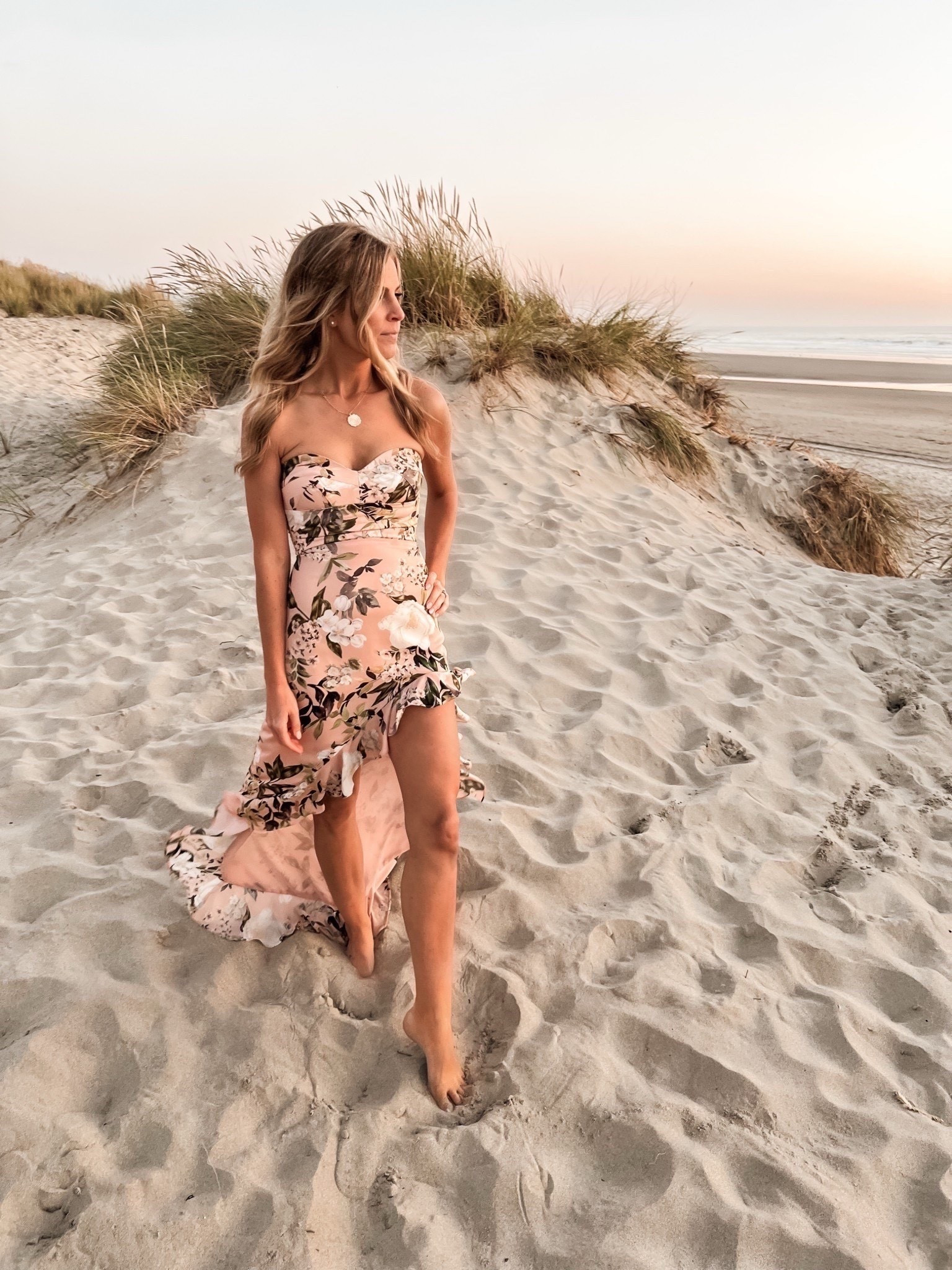 This dress is fully stocked 🐚!!!! Wearing a size small. 

#beach #family #photos #outfit #inspo #midi #high #low #dress #coast #beachy #pink #peach #floral #revolve #outfit #ideas #inspo #ruffle #gown #summer #fall #spring #coastal #formal #vacation #travel #island #tropical #graduation #wedding #guest #photography #maxi #party #parties #resort #wear @Revolve 
#prom #dance

#LTKTravel #LTKWedding #LTKTall