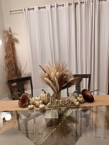 Fall season is here so thought I’d show you guys how I designed my circular dining room table. Loving the earthy tones and how the decor gives dynamic with the different sizes and textures of the pumpkins and love how they compliment the pampas and my ‘LOVE’ gold piece 🤎 How did you decorate your table for the Fall?! 🍂

#LTKSeasonal #LTKSale #LTKhome
