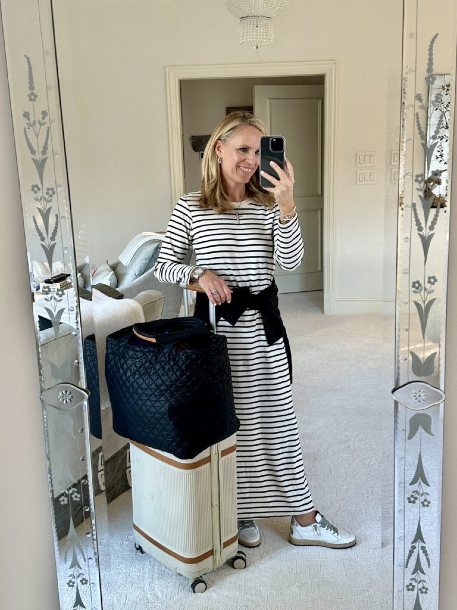 This might be my favorite travel look! This long sleeved striped long T-shirt, dress is so soft and comfortable! I’ve also linked my favorite travel tote, the MZ Wallace large metro tote, and the best rolling suitcase, the Paravel aviator plus

#LTKFind #LTKtravel #LTKstyletip