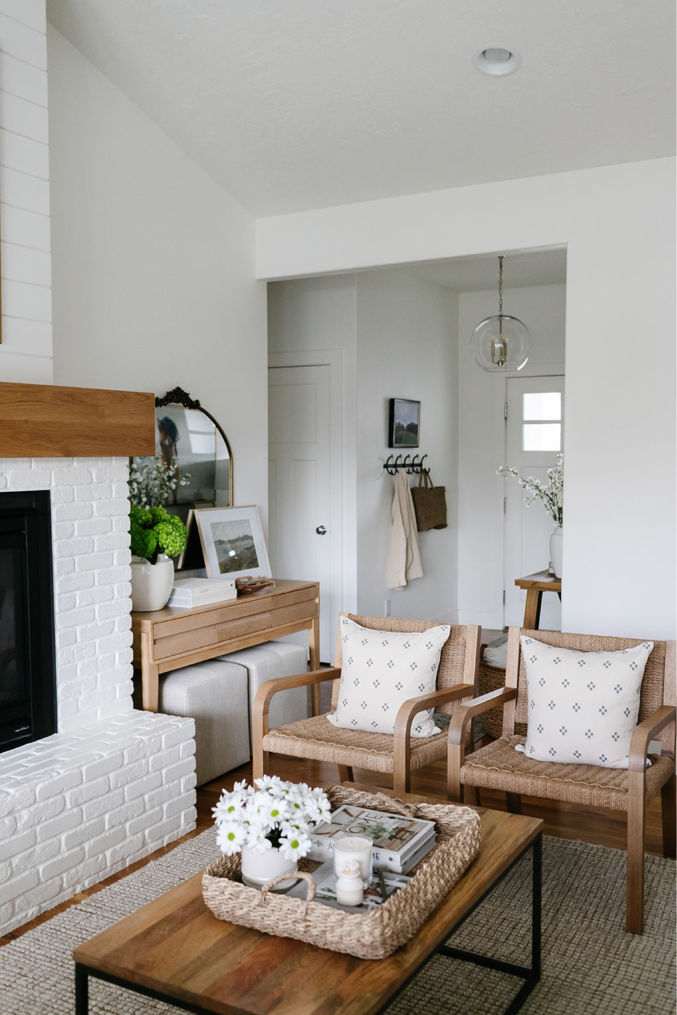 Summer decor perfect for a living room - a small vase filled with fresh or faux flowers, throw pillow covers in summer colors!

#LTKstyletip #LTKhome #LTKSeasonal