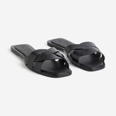 Black slide sandals 

#LTKshoecrush #LTKfindsunder50 #LTKSeasonal