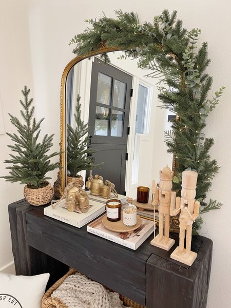 HOME \ Christmas decorated console table and mirror! Love the draped garland - Target find!

Holiday 
Walmart
Tree
Candle
Bells

#LTKHoliday #LTKfindsunder50 #LTKhome