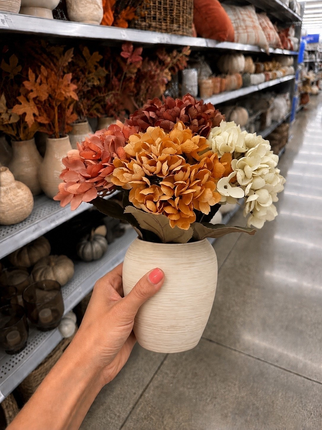These warm fall florals are such a pretty way to bring the season into your home. They would look beautiful as a table centerpiece or styled on a shelf with your favorite decor. A simple way to add some cozy fall color throughout your space.

#LTKSeasonal #LTKHome #LTKdayinmylife