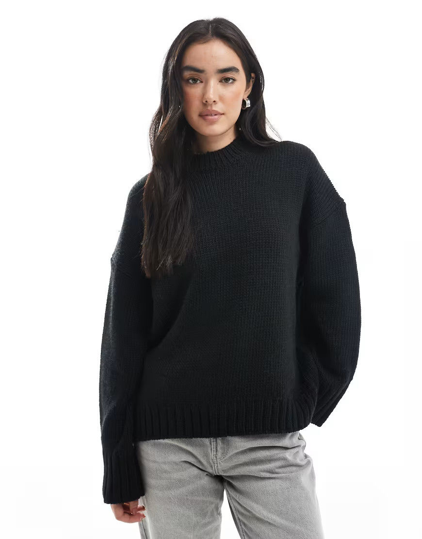 ASOS DESIGN super oversized chunky crew neck sweater with curved hem in black | ASOS (Global)