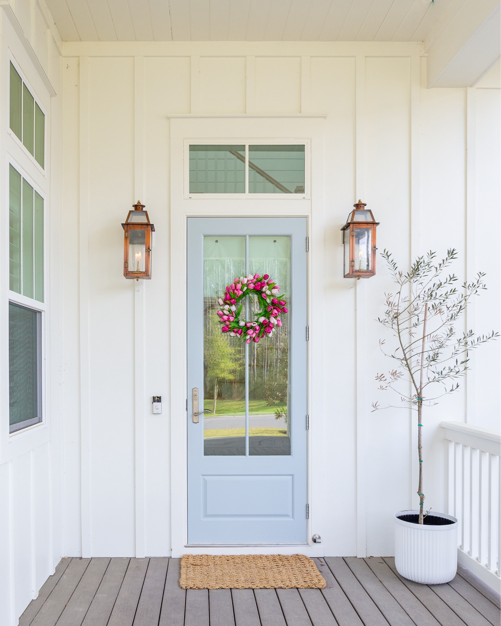 Loving this pink tulip wreath on our front door for spring! It looks so cute paired with our copper gas lanterns, fluted planter and woven door mat.
.
#ltkhome #ltkfindsunder100 #ltkfindsunder50 #ltkstyletip #ltksalealert spring front porch decorating 

#LTKSeasonal #LTKhome #LTKsalealert