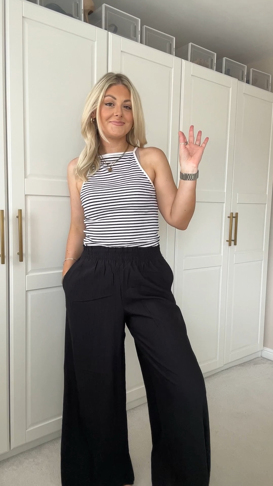 Wide black lightweight trousers, stripe top, sleeveless stripe top, wide trousers, summer trousers, crinkle trousers, trousers with pockets 🫶🏽

#LTKuk #LTKstyletip #LTKsummer