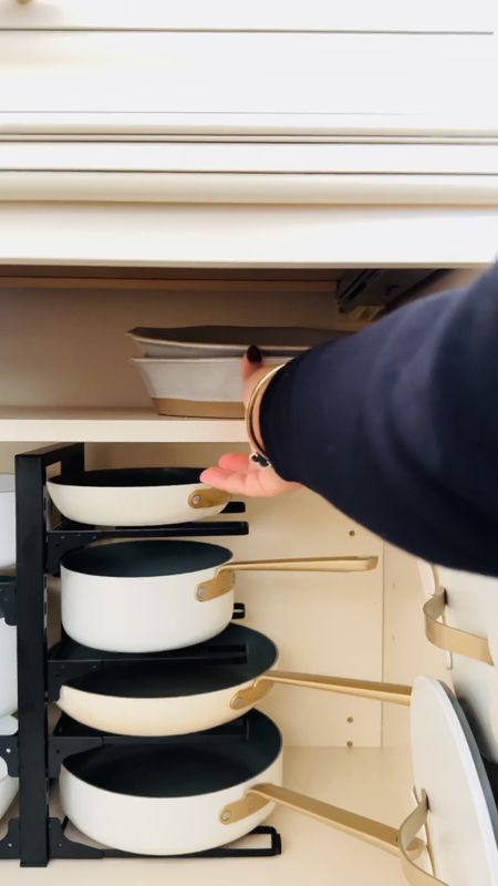 Ok so this pot and pan organizational rack is a total game changer!! It truly helps keep all my cookware easy to reach and organized when I need it! No more stacking heavy cookware on top of each other!! Also, how amazing are my adhesive lid holders!! Just peel, stick and insert any size lid for easy organization. I’m usually the silky one who can’t ever find the right lids to my pots and now I can finally find them in one place! To say I’m obsessed with the Amazon finds is an understatement!! 

Ceramic cookware 
Amazon pot and pan organization rack
Amazon peel and stick lid organization  
Amazon home 
Amazon kitchen must haves 
Amazon Home 
Amazon finds 
Kitchen cookware 
Budget friendly kitchen organization 
Cabinet organization 

#LTKhome #LTKVideo #LTKSpringSale