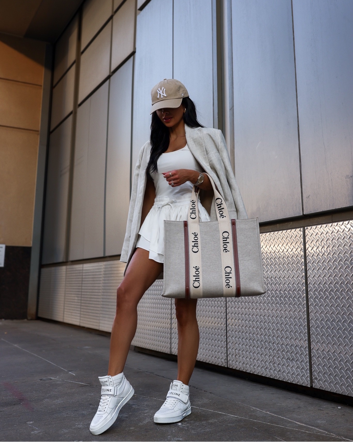 Casual summer outfit
Free People white dress wearing an XS
Mango linen blazer wearing an XS
Celine sneakers
Chloe woody tote
NY Yankees nude cap



#LTKunder100 #LTKshoecrush #LTKitbag