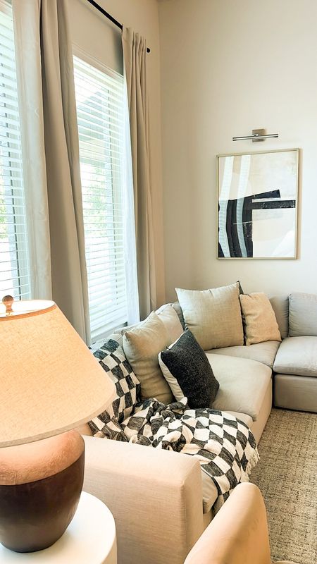 Living room furniture. Minted artwork. Amazon picture light and curtains. Color is birch size is 50x120. Pottery barn pillows. Target throw pillows. Gorgeous oversized lamp. Living spaces couch (can’t link)  

#LTKhome #LTKsalealert #LTKxTarget