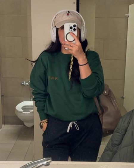 airport fit check sorry for the toilet pic 🤣 but had to make sure I had my pit stop before boarding the plane! 
Vuori size M pants, come right to the ankle like a cropped hem,  I’m 4’6. 
Mandarin embroidered  sweatshirt in L. 

#LTKtravel