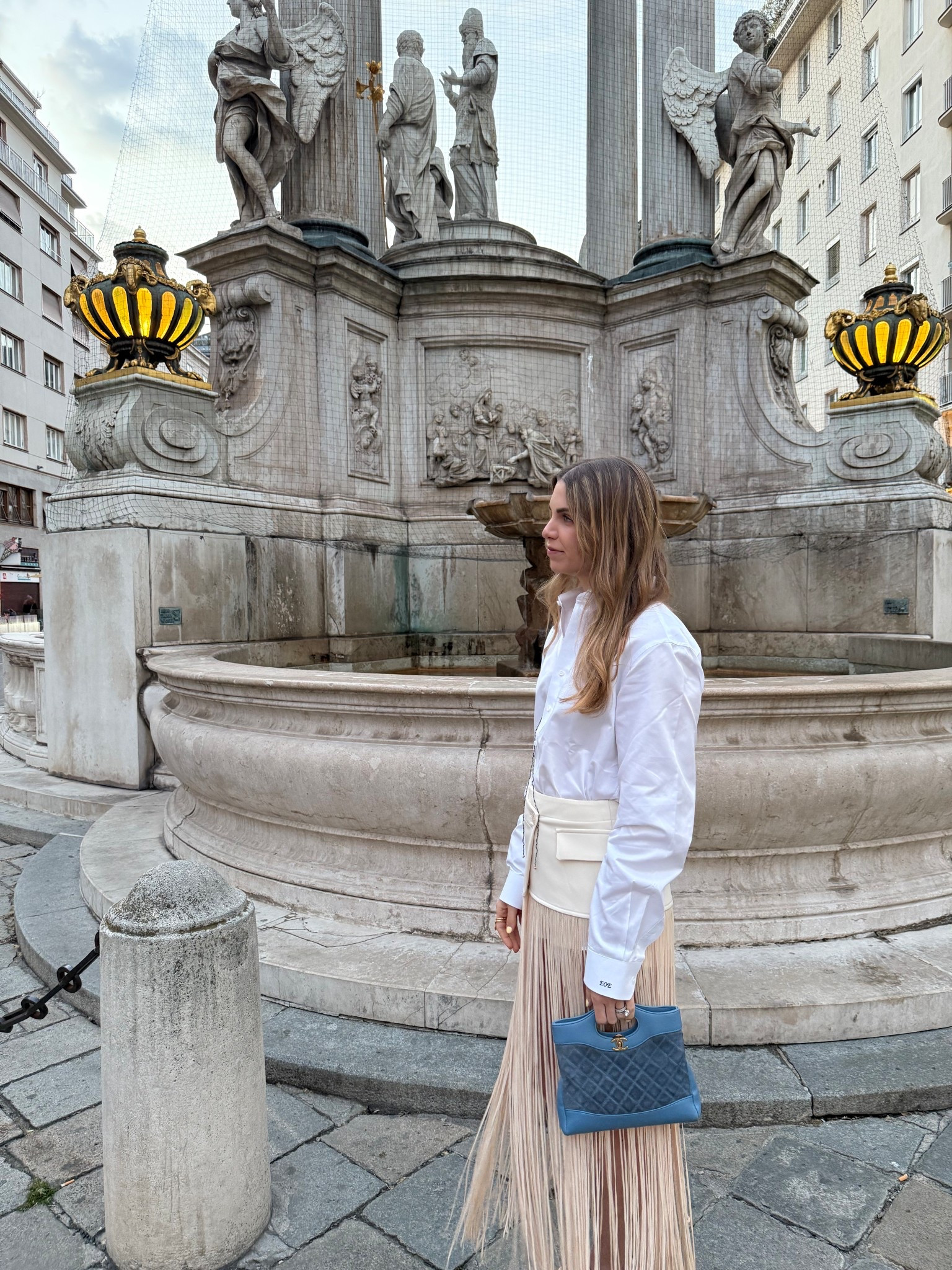 Oversized blouse tucked into this fringe skirt will be my spring uniform , skirt is OS & size up in shirt for boyfriend shirt/slip effect. Slip is true to size, I’m size s. 

#LTKootd #LTKvlog #LTKTravel