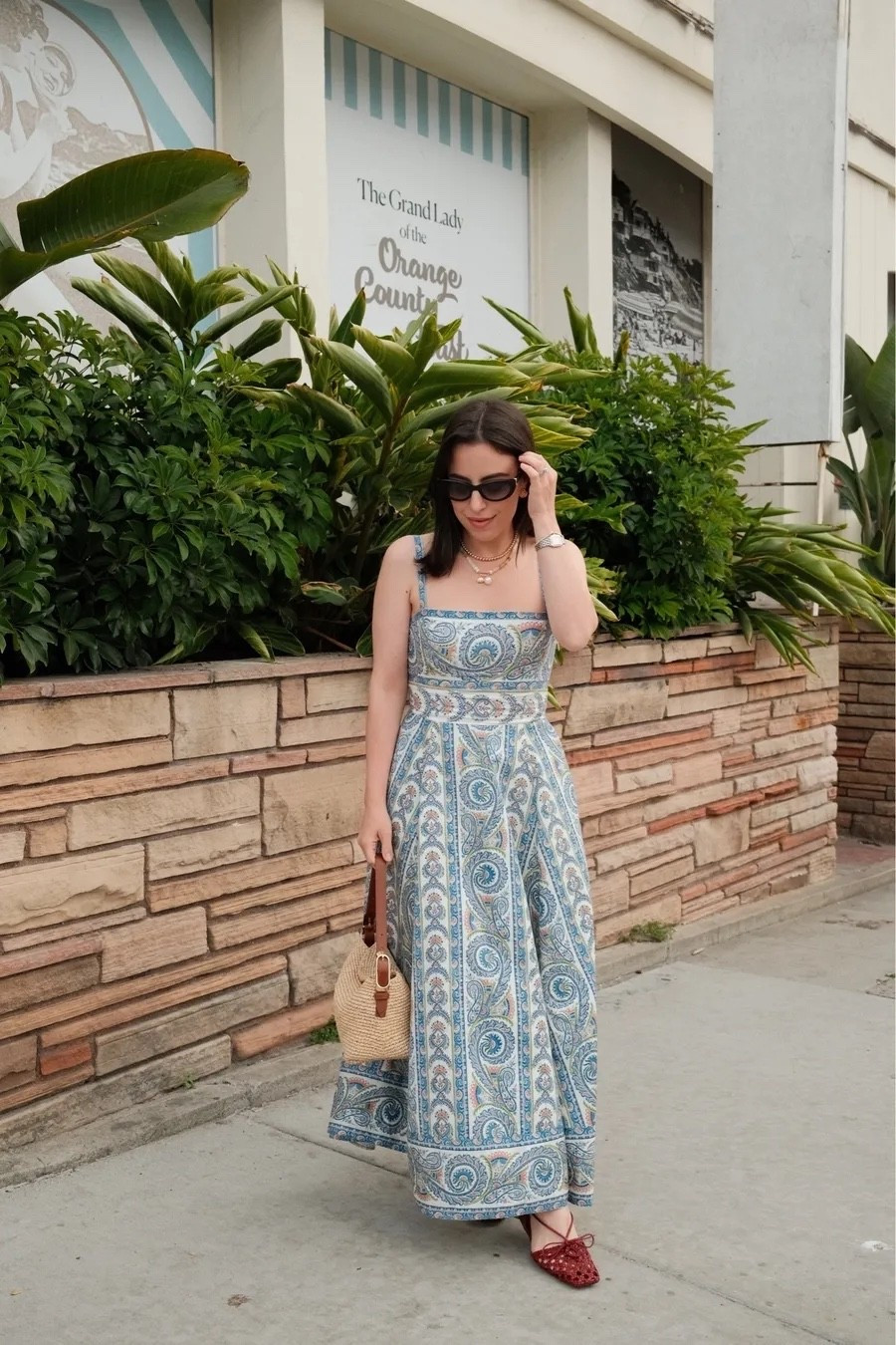 Who says you can't pair bold-colored sandals with a pastel dress? My outfit begs to disagree! I'm absolutely obsessed with the fit and the details of this dress, and can we talk about how unique the braided slingback design on these sandals are?

summer outfit, vacation look, rainbow necklace, dressy style, raffia shoulder bag, get this look, fashion inspo, casual chic

#LTKootd #LTKU #LTKPetite