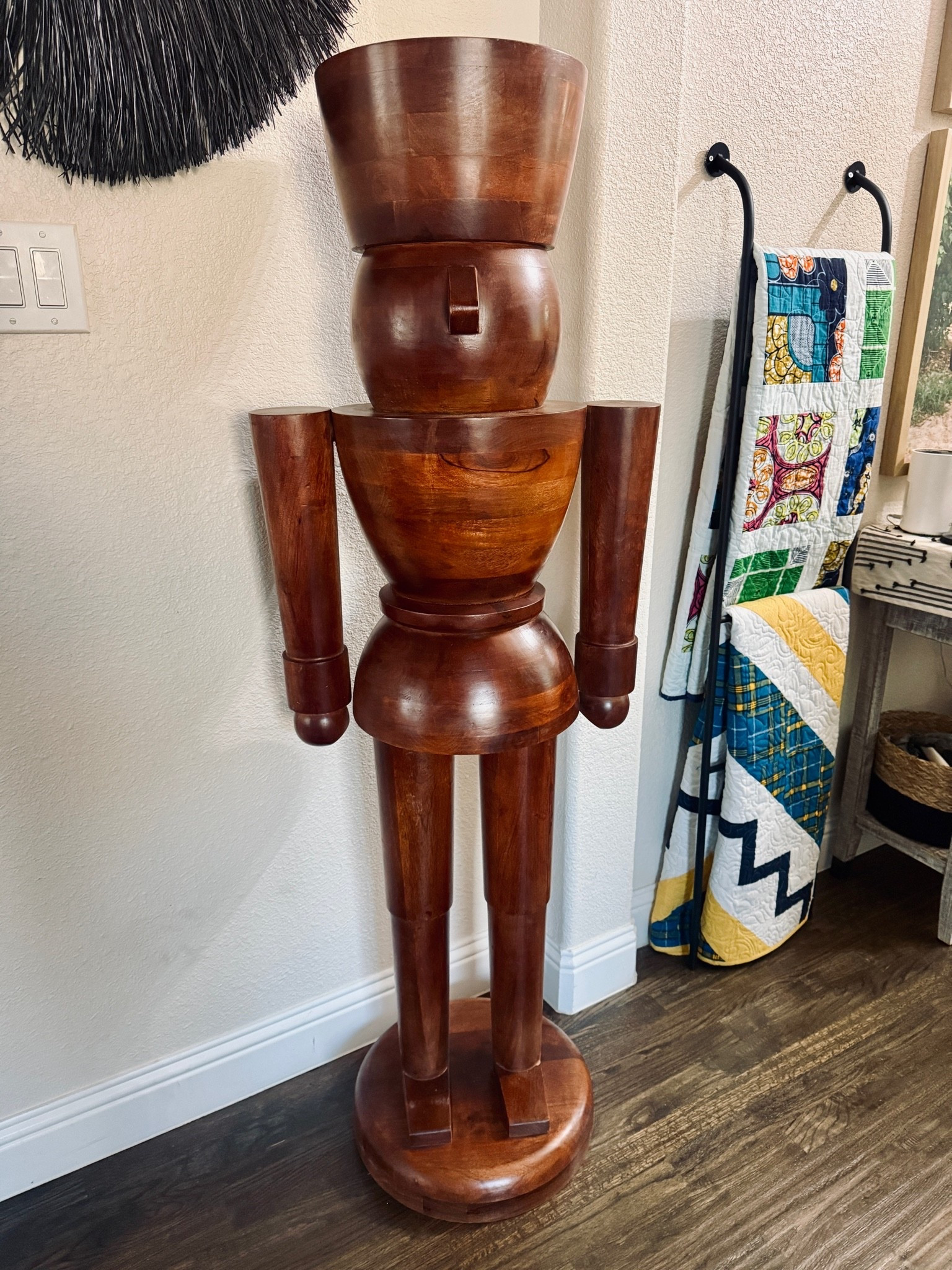 Oh hey, handsome!! This 60" giant wooden nutcracker is from Walmart HOWEVER the shipping was AWFUL. The first came broken & in a very tattered and flimsy box. I would try to find him in store!