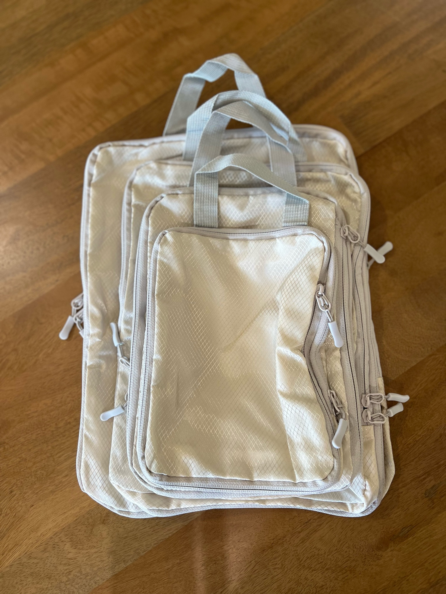 Compression packing cubes for travel. They help you pack SO much more in your suitcase and bag. I have the set of 4. Also linked another retailer with great reviews. 

#LTKTravel #LTKFindsUnder50