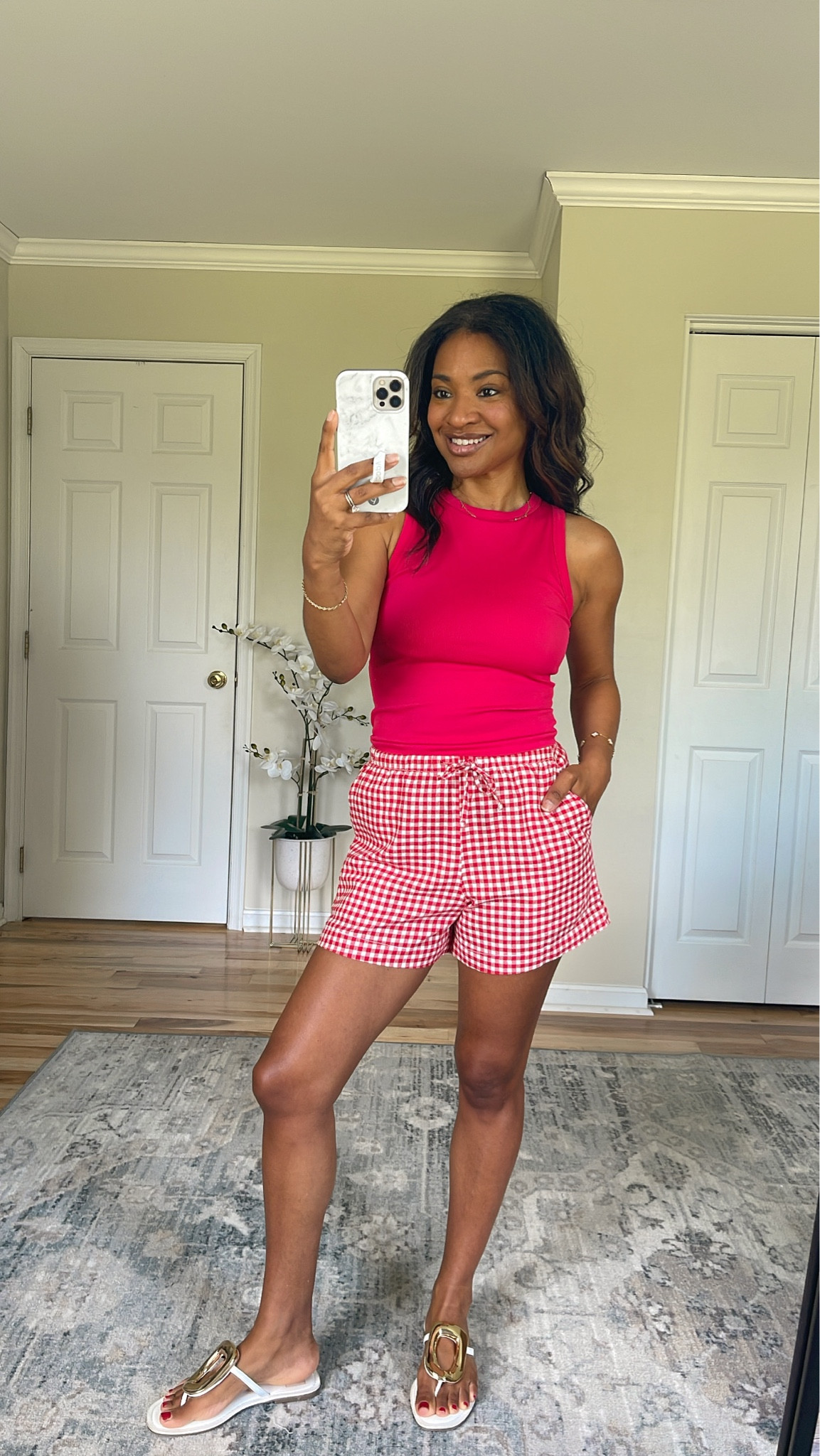 Wearing a medium in the top (I recommend sizing up at least two sizes if you have a large cup size like I do). And wearing an XS in the shorts which are TTS  

#LTKgrwm #LTKOver40 #LTKootd