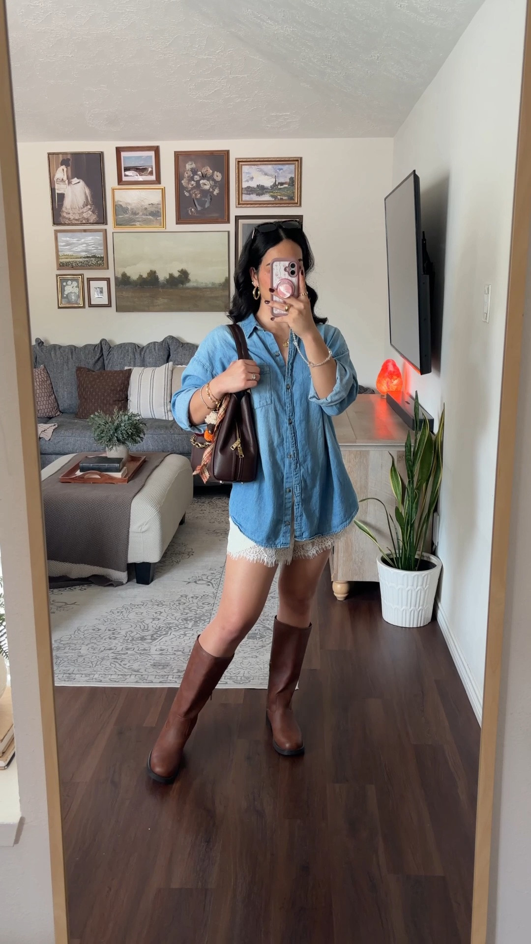 OUTFIT OF THE DAY ✨ denim shirt dress, denim mini dress, chambray shirt dress, oversized denim shirt, denim shirt outfit, blue denim dress, denim shorts, white lace shorts, lace trim shorts, brown knee high boots, brown leather boots, knee high boots outfit, brown boots outfit, brown Coach bag, Coach shoulder bag, Coach handbag, fall outfit, fall fashion, autumn outfit, transitional outfit, summer to fall outfit, casual fall outfit, western inspired outfit, western chic outfit, country chic outfit, casual chic outfit, denim and brown outfit, blue and brown outfit, fall layering, cute fall outfit, everyday outfit, weekend outfit, brunch outfit, coffee date outfit, shopping outfit, travel outfit, cozy fall style, classic outfit, effortless outfit, feminine fall outfit, fall accessories, statement handbag, handbag charms, bag charm, cherry bag charm, plaid bag charm, fall handbag, LTK fashion, outfit inspiration  

 #LTKdayinmylife #LTKgrwm #LTKootd