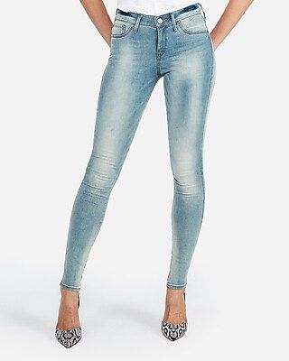 Mid Rise Faded Extreme Stretch Jean Leggings | Express