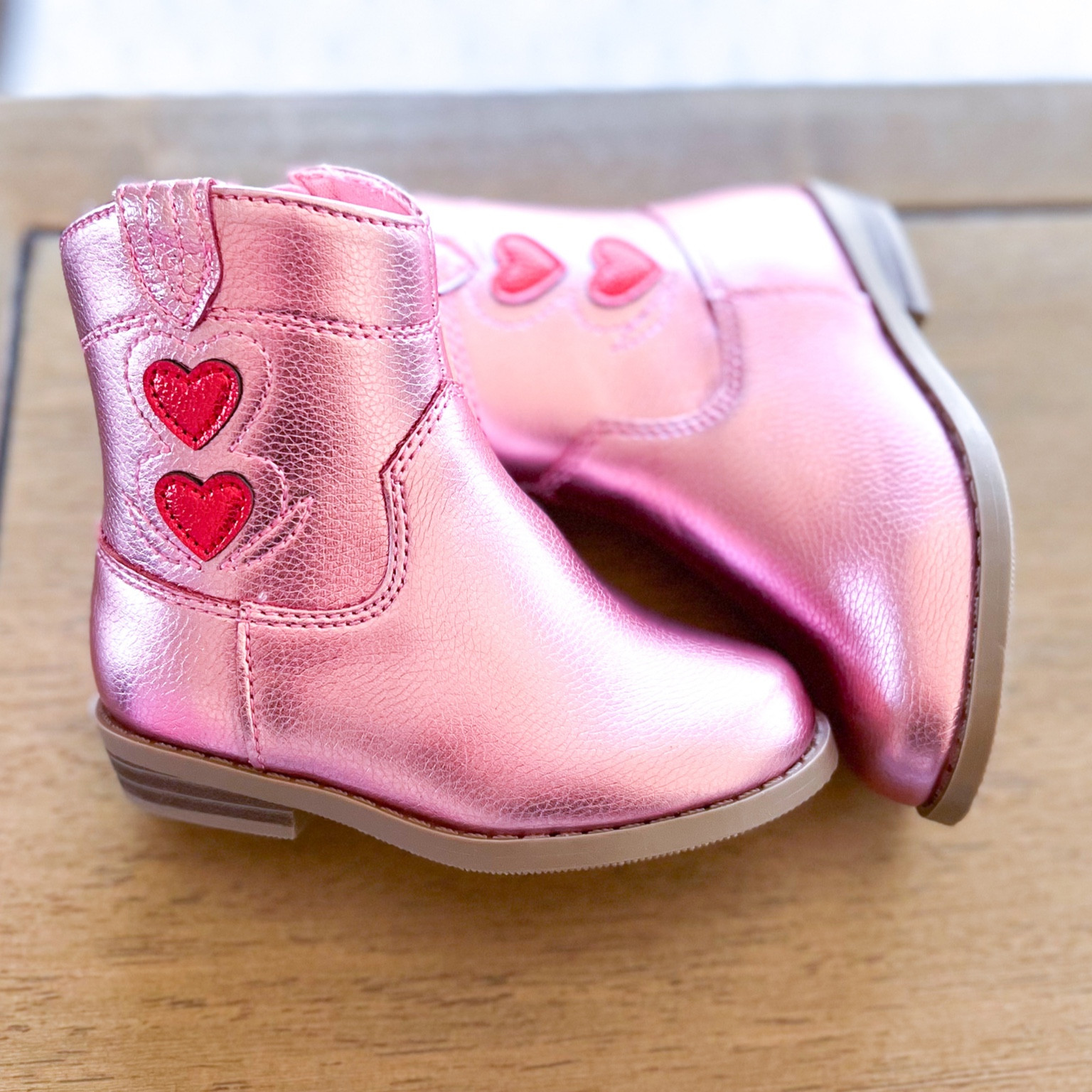 Baby girl cowgirl boots but make them metallic pink, please..oh and add hearts! Could these be any sweeter?! 🥰

#LTKkids #LTKshoecrush #LTKbaby