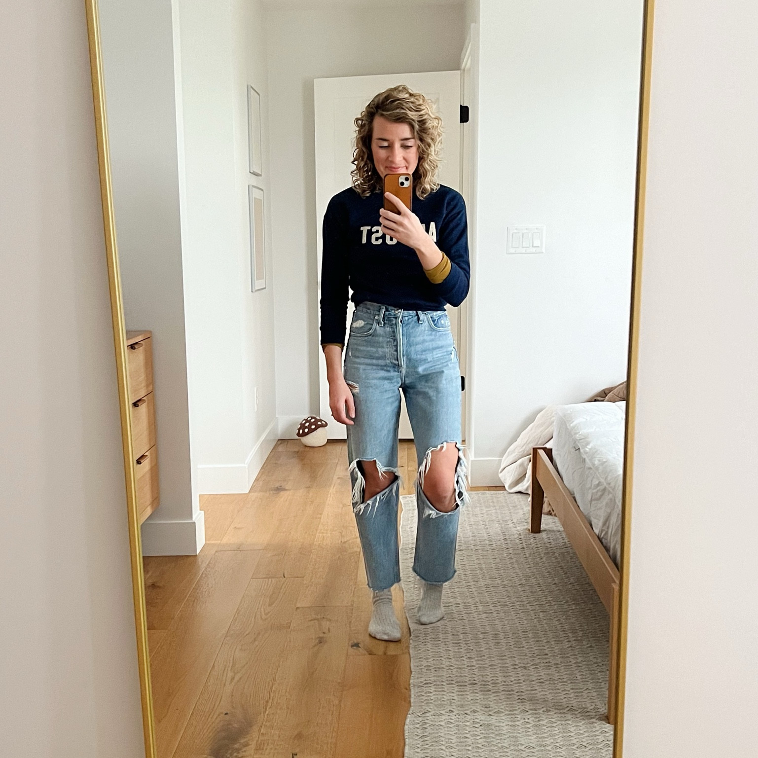 Sweatshirt is vintage and tee is an old color, but I linked the exact same style  