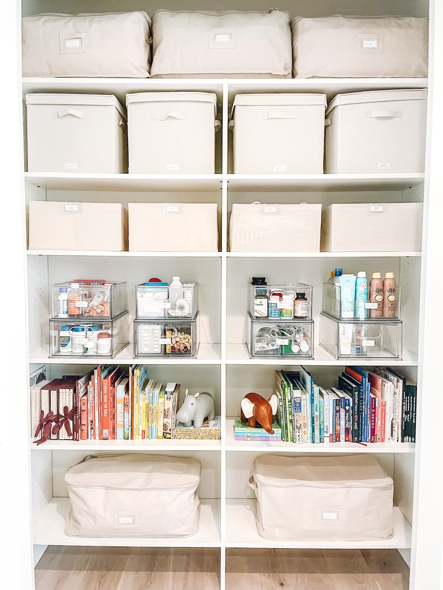 Linen closet organization. Home Edit divided all-purpose bin and stackable drawer. The Container Store open canvas bin, canvas storage cube, and small zippered storage bin✨

#LTKhome #LTKkids #LTKfamily