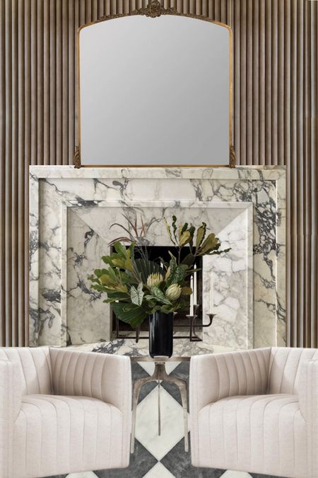 Marble mantles make the whole room look luxurious!
.
.
.
.
.
Living room design, living room inspo, flower bouquet, swivel accent chairs, accent table, ornate mirror, Victorian mirror

#LTKSeasonal #LTKhome #LTKsalealert