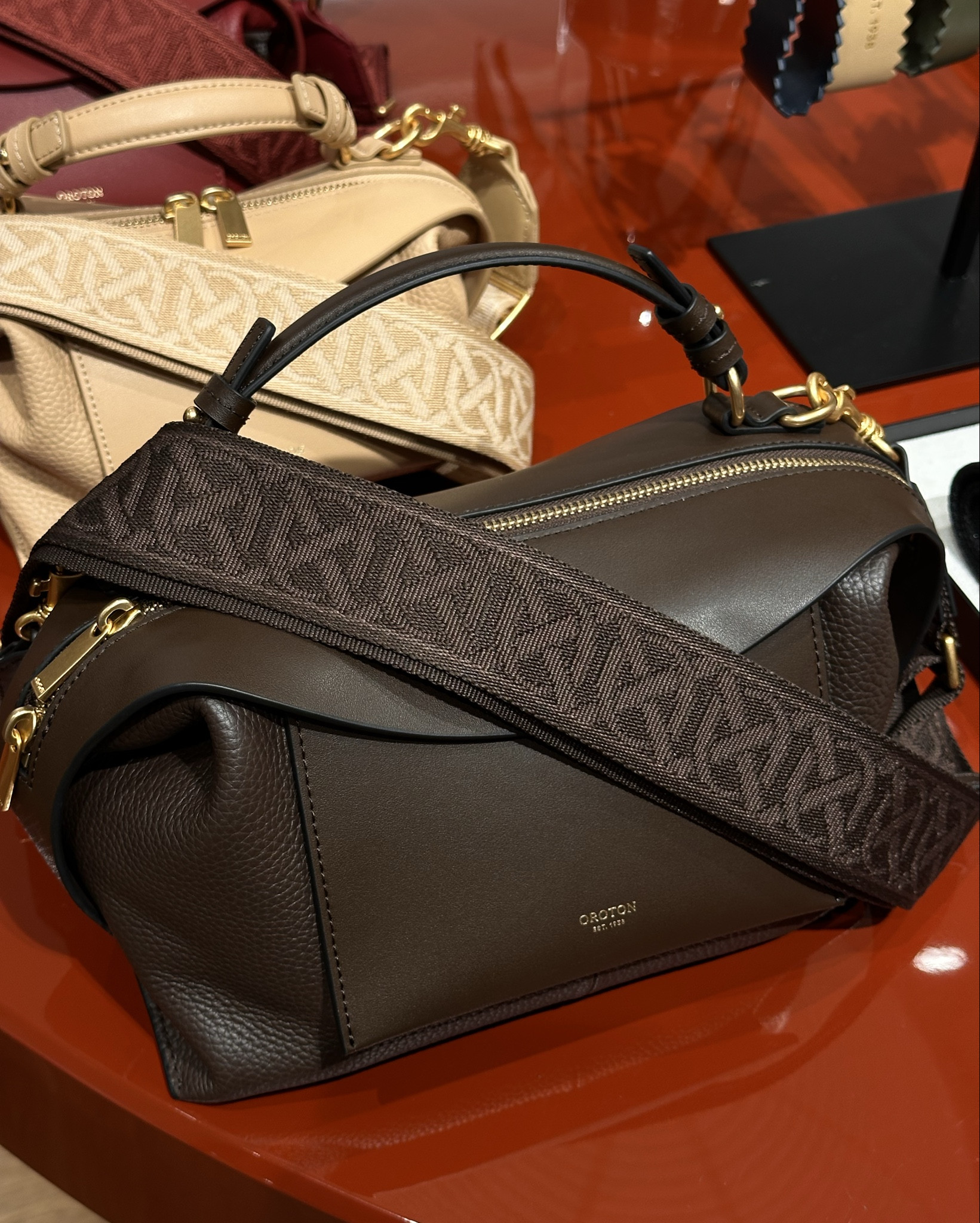 The Oroton Mica Bag now comes in chocolate! 😍🤎 The Mica is a dupe for the Loewe Puzzle bag and the quality is just as good. The guitar strap makes it even better. Comes in the small (pictured) and mini.

#LTKbag #LTKFashionMonth #LTKaustralia