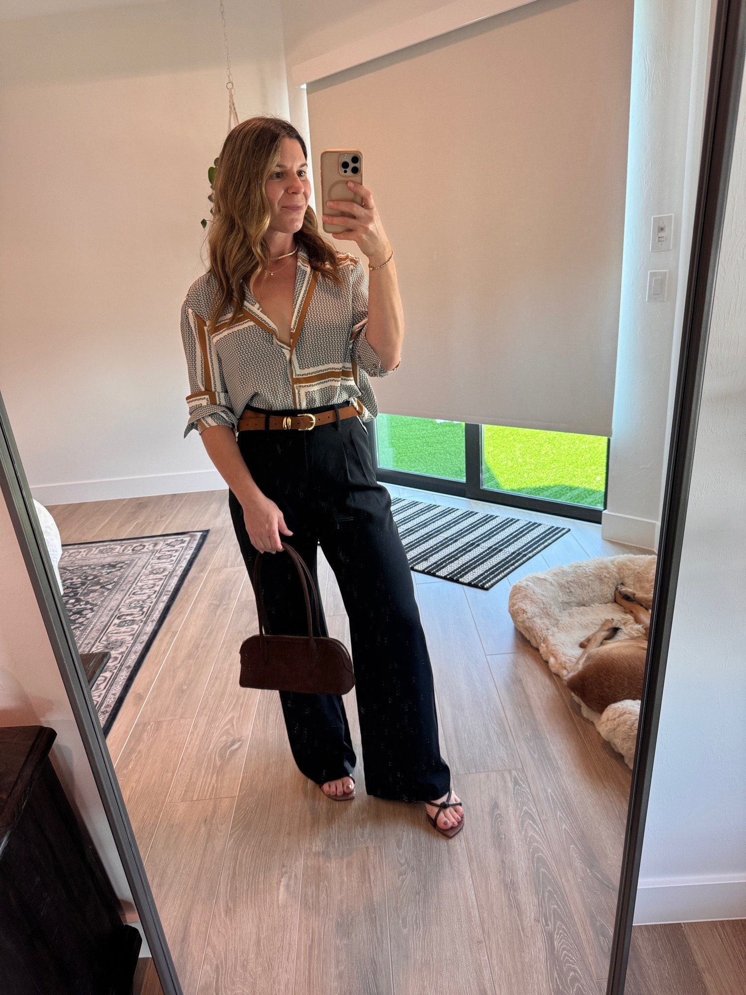 Ever since I got my colors done  by and learned I was a warm autumn I’ve been avoiding wearing the color black. I was packing for a New York trip this weekend and wanted to wear a pant look but only had these tailored pants from Abercrombie I purchased a couple of years ago before I knew better. Luckily for us warm autumn’s wearing black doesn’t mean never, it just means being strategic. 

The pants were far enough away from my face, so it didn’t really clash with my features and I brightened up the whole look by wearing camel and brown. You better believe my next investment will be a pair of tailored pants and a more appropriate warm, autumn shade this season! ￼ These are the Abercrombie tailored wide leg pants and a size small ￼