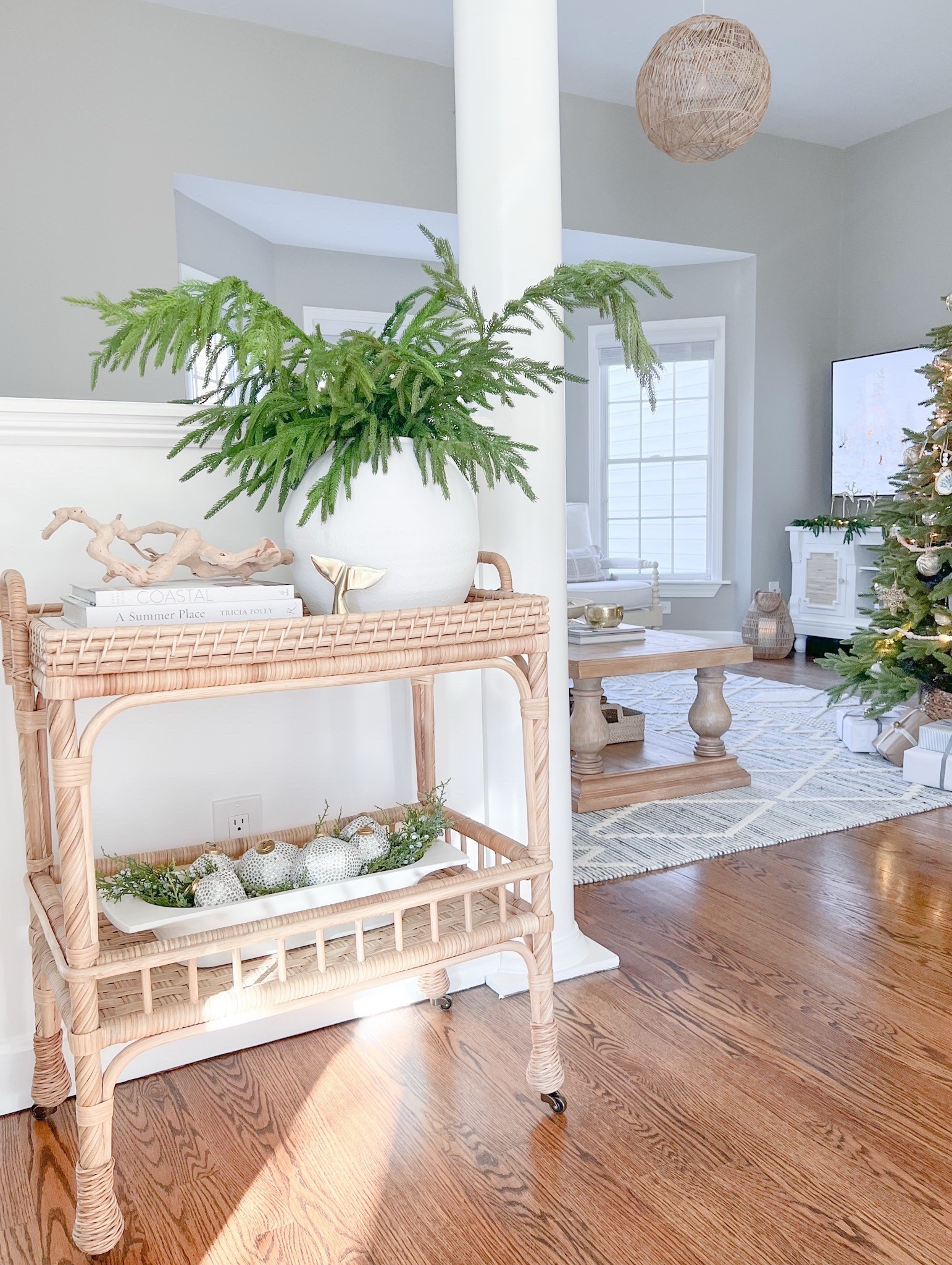 My bar cart is great for holiday entertaining & can be used as a small console table like I often do! 
-
Serena & Lily bar cart, woven bar cart, rattan bar cart, bar cart on sale, christmas bar cart, holiday bar cart, christmas decor, large white vase, living room rug, blue and white rug, 8x10 rug, greenery, coastal coffee table books, woven tree collar, christmas tree collar, driftwood, amazon coffee table books, neutral coffee table books, bar cart decor, white dough bowl, Norfolk pine branches, afloral Norfolk pine

#LTKHome #LTKHoliday #LTKFindsUnder100