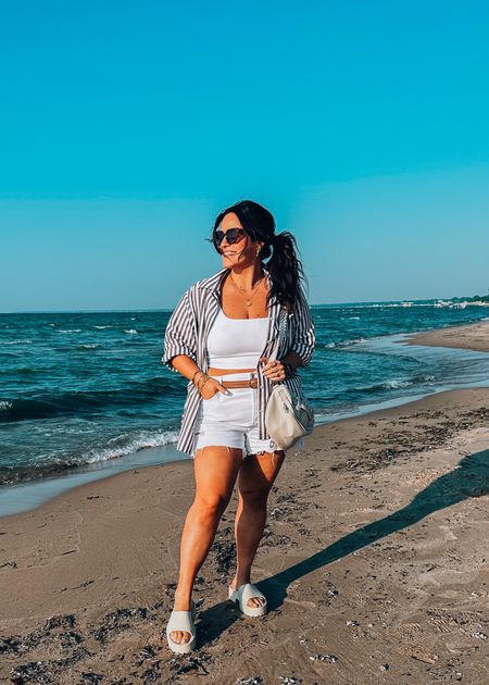  Midsize summer lake outfit 
Xl in my striped button down
Large in the cropped bra top
White stretchy shorts wearing a size 16 (sized up for Looser fit) 
Amazon clog sandals tts 
Sling bag. 


#LTKtravel #LTKcurves #LTKSeasonal