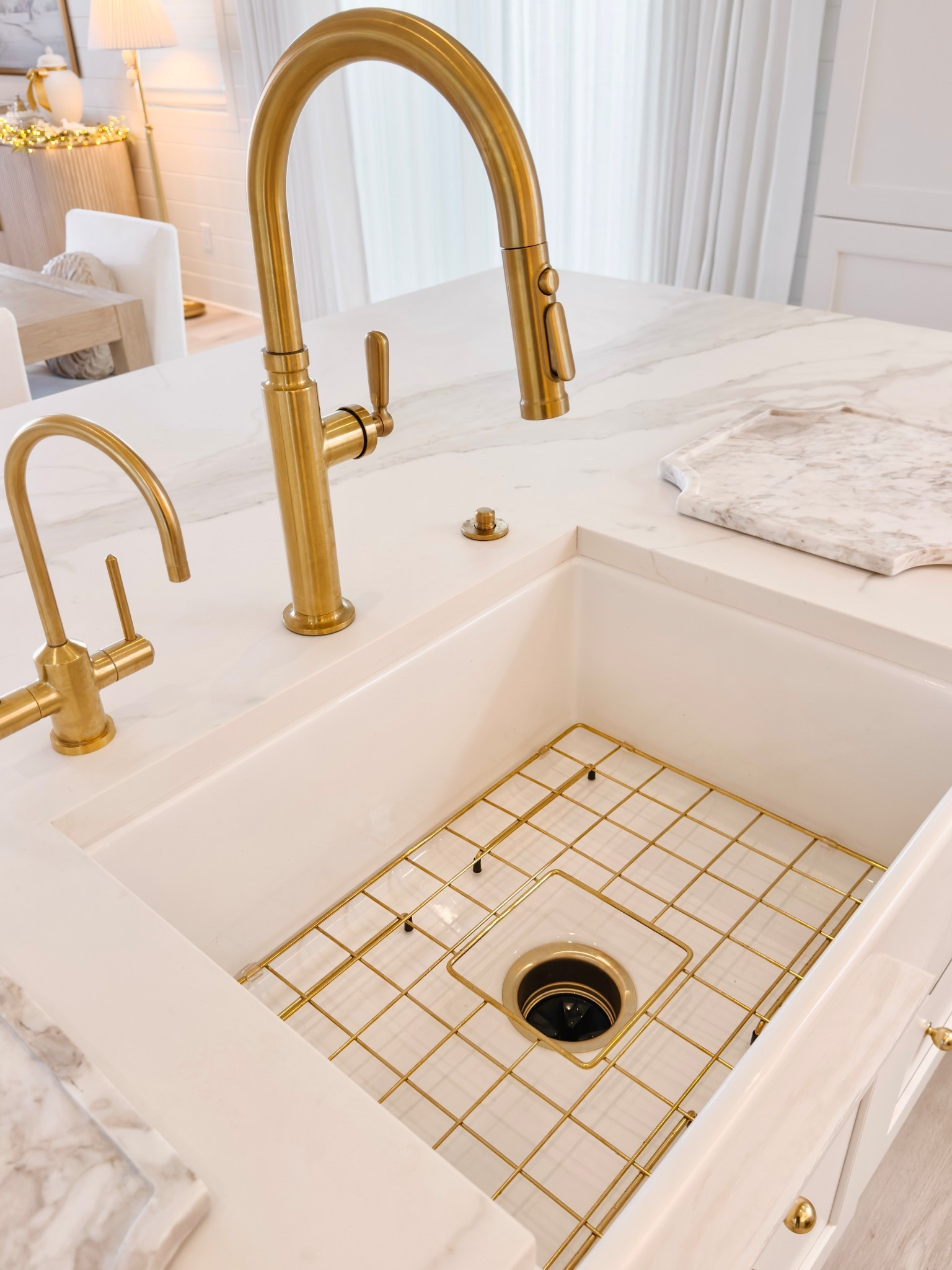 Prettiest gold sink grate! Comes in several sizes and protects your sink from clanging pots and pans 👏🏼

#LTKHome #LTKfoodie