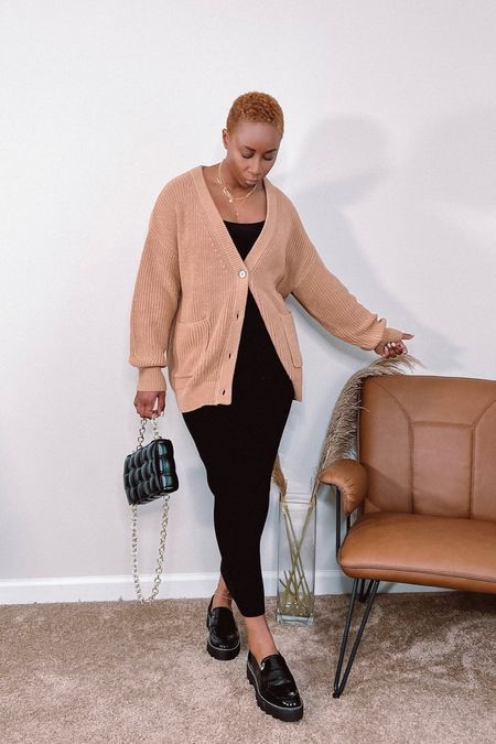 Tan cardigan with black knitted midi skirt 

#LTKSeasonal #LTKHoliday #LTKCyberweek