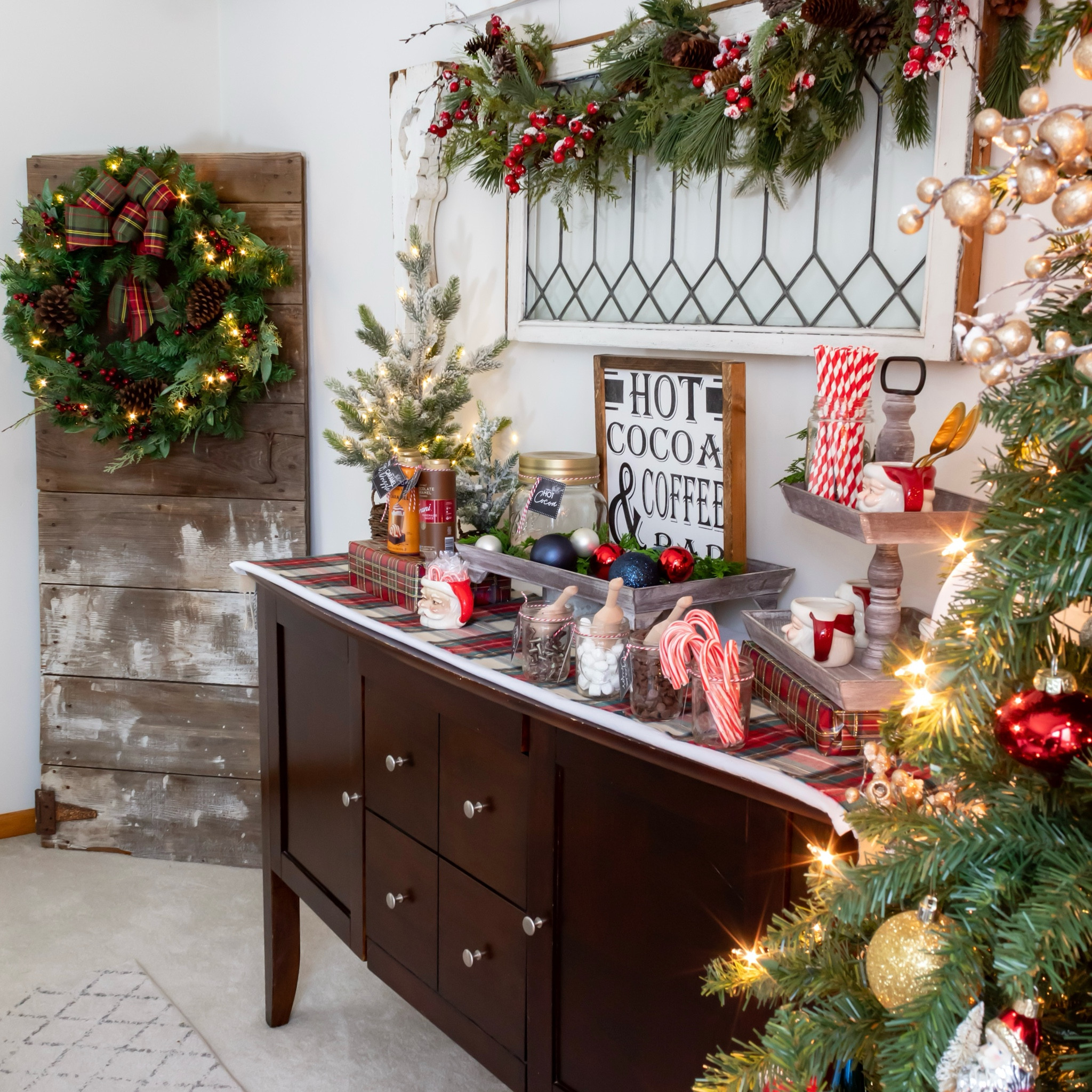Decking the halls with red and blue Christmas decorations and a cozy hot cocoa bar set up in the dining room 

#LTKSeasonal #LTKHome #LTKHoliday