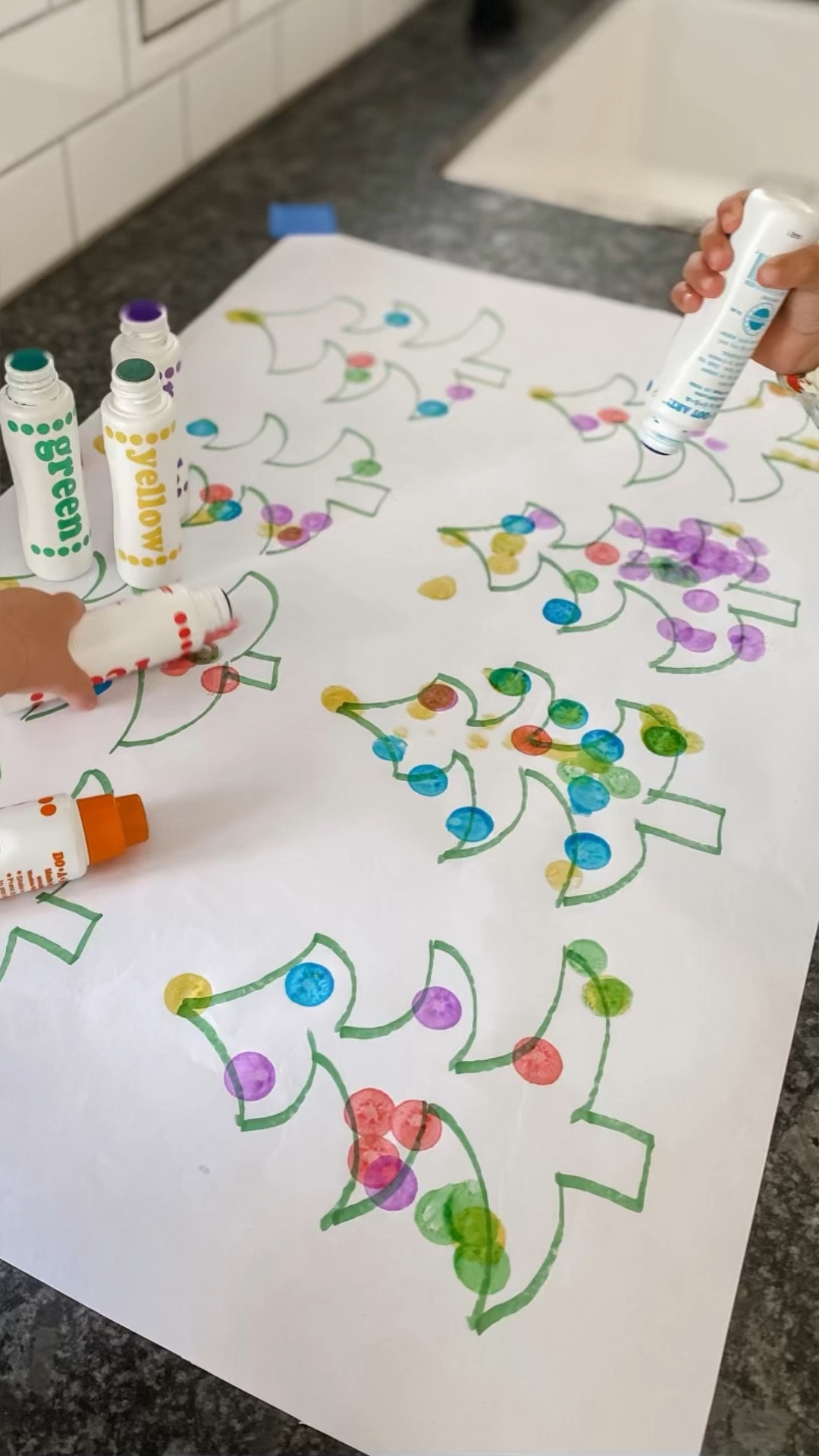 Dot Marker Christmas Tree activity for toddlers and preschoolers ages 2+. Supplies include Melissa and Doug’s white roll paper, Do a Dot Art’s dot markers, a green marker, and painters tape. 

Also linked are our favorite full-coverage art smock and collapsible kitchen helper stool.

#LTKSeasonal #LTKkids #LTKHoliday
