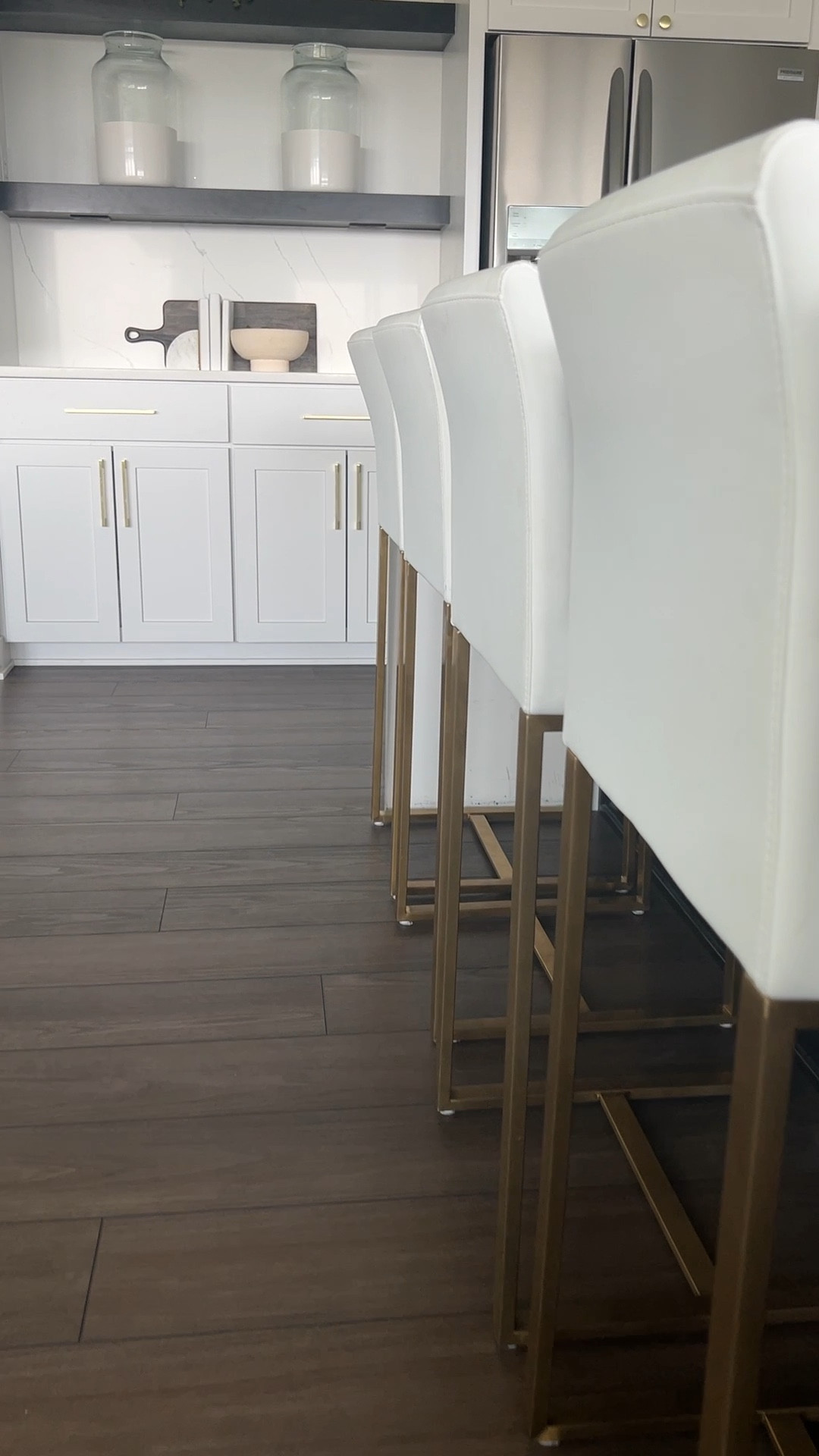 Obsessed with my modern white  leather with gold legs island stools.

White barstools, white leather chair, white and gold stools, white counter stool, island stool with back, modern island stool

#LTKhome