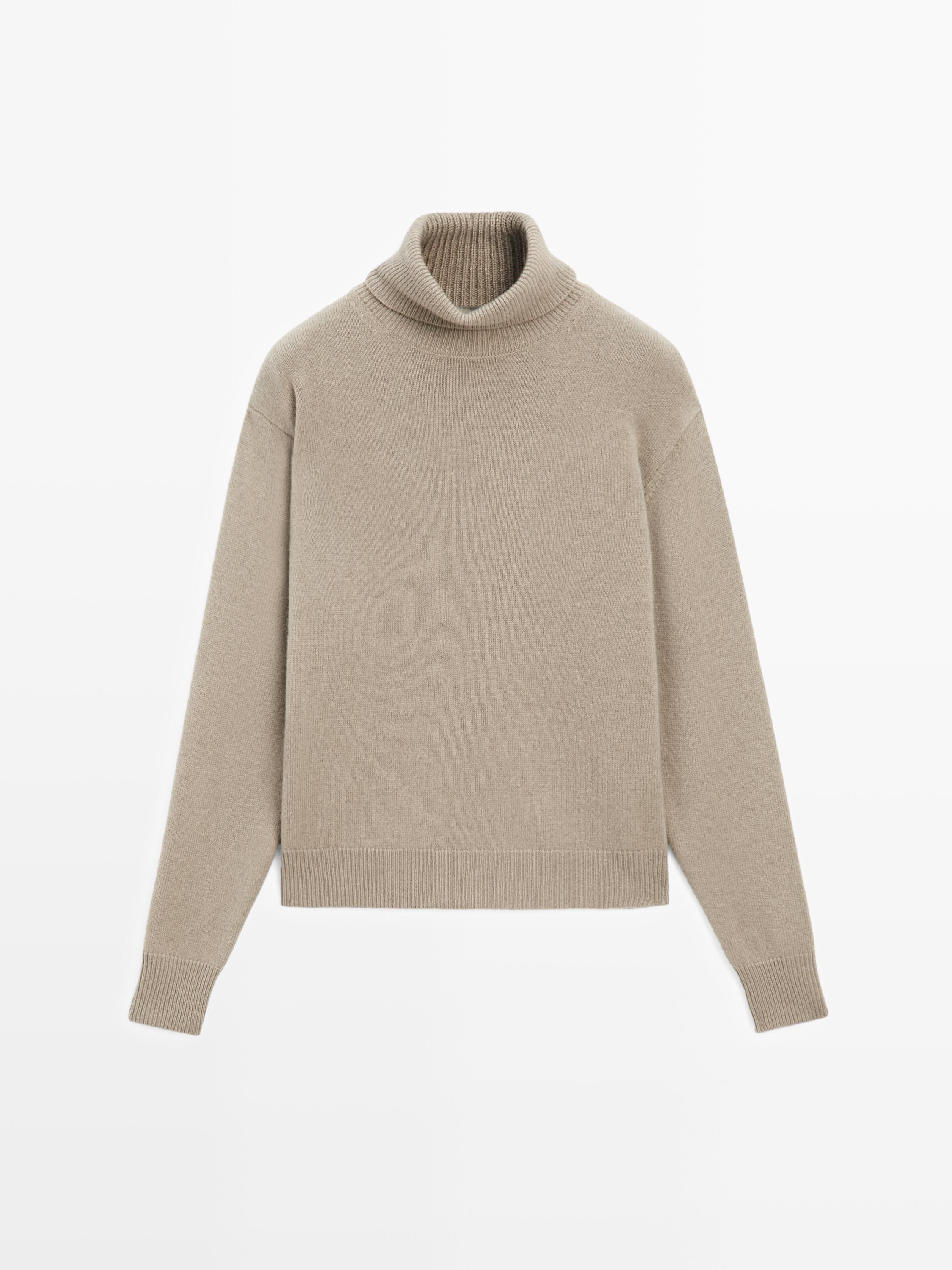 Knit sweater made of a wool blend fabric . Long sleeves. Ribbed trims . | Massimo Dutti UK