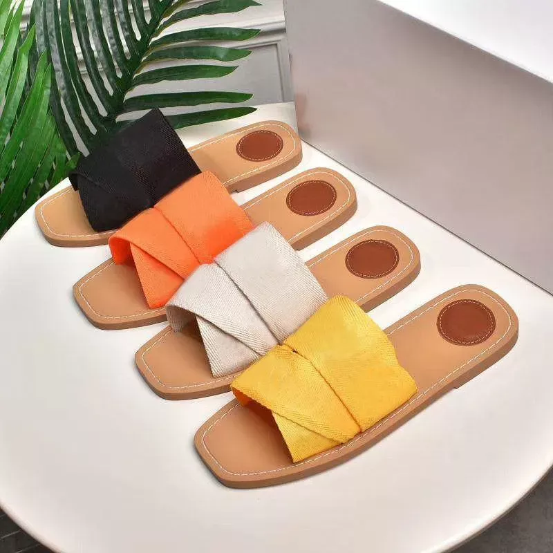 Designer Canvas Cross Woven Woody Mules Cross Slippers Price For