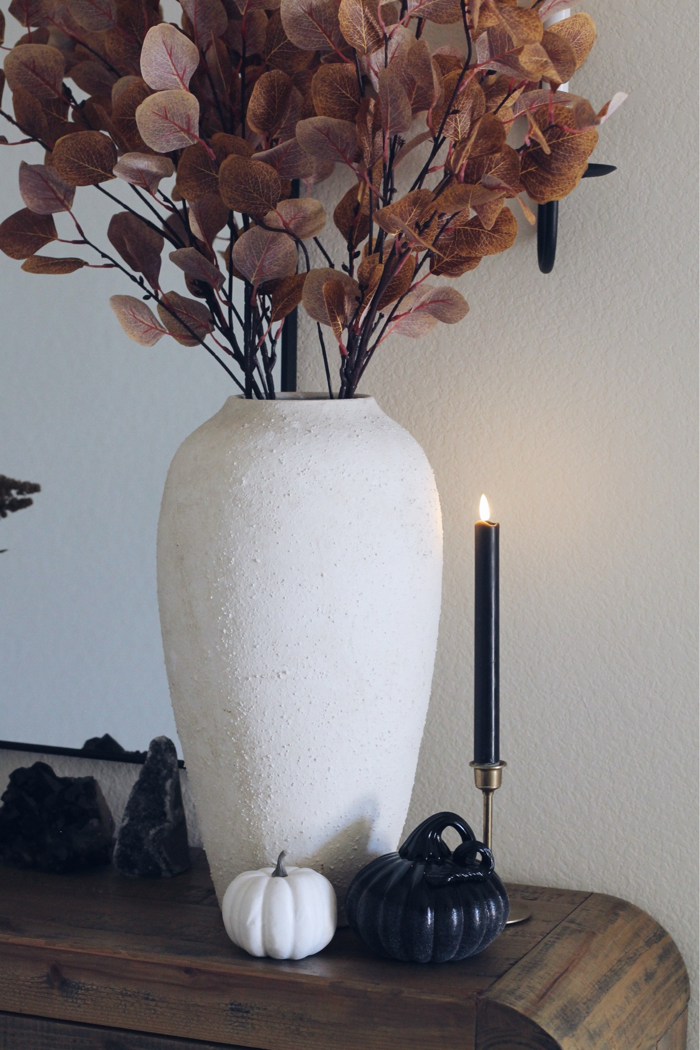 Halloween decor
Black pumpkins
Crystals and stones 
Cb2 white vase
Fall eucalyptus leaves branches
Black candle
Gold candlestick holder
Entryway decor
Modern neutral home decor

#LTKhome #LTKHoliday #LTKHalloween
