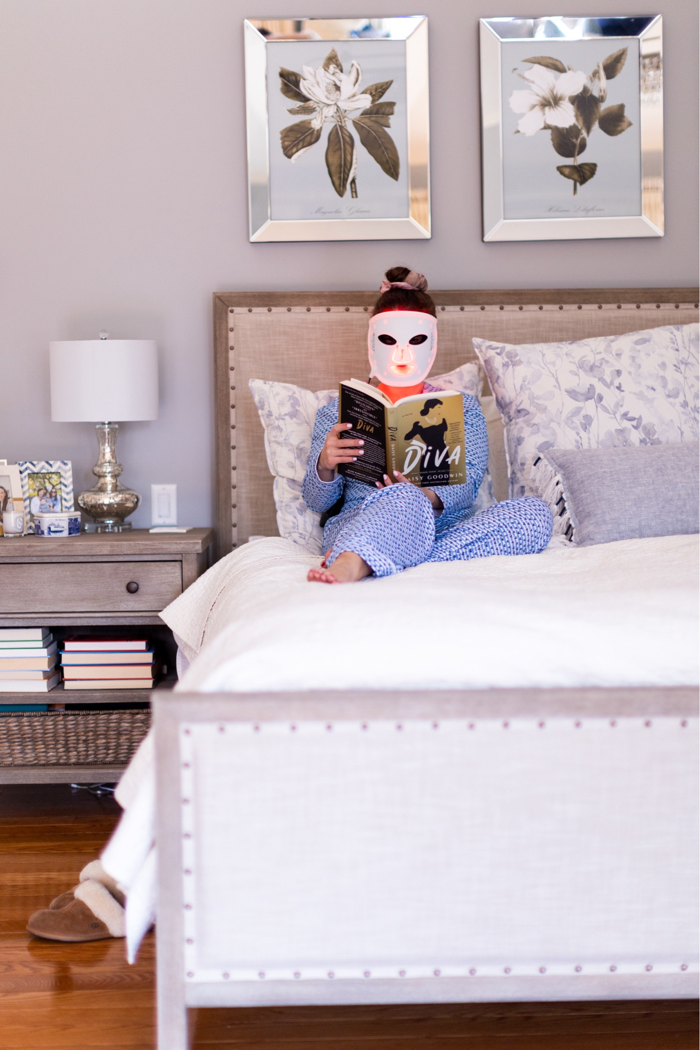 Talking about one of the items I get asked about most in today’s blog post- my red light mask! 🧖🏼‍♀️ I have and love the @lightsalon Boost LED Mask and have been devoted to it for over a year! 

I shared all the deets on my site, but the TLDR version is this- I love the mask- It has absolutely helped my fine lines and skin tone! It is an essential part of my nighttime routine- wash face, climb in bed, put on mask and read my book. This is all with the caveat that the skincare products that are worth investing in are the ones you’ll actually use- I use mine regularly but you have to commit to that if you invest in one! 

Ps- when @frameoflifeproject and I were taking these photos Mike came in and couldn’t believe I’d post these on the internet- No shame here 🤣