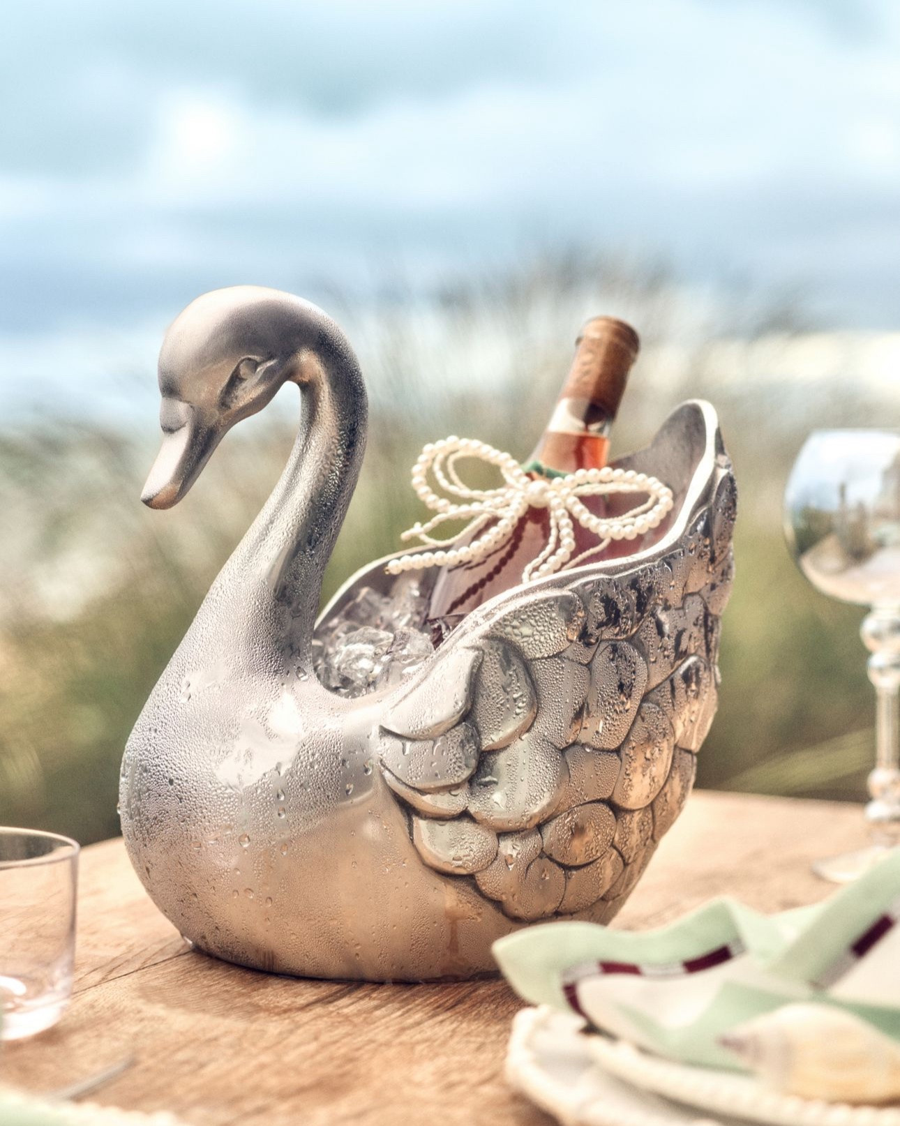 Delphine Swan Ice Bucket
10.75"H, 10"L, 7"W

All things Swans please! Weddings, showers, garden parties… any event!