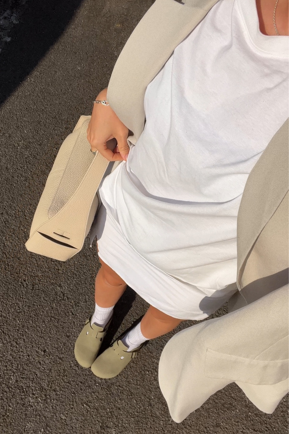 Beige outfits are the best neutral style for summer. Styling a crisp white tee with linen skirt and birkenstock bostons in vegan khaki - greige blazer over the top! 

#LTKeurope #LTKunder100 #LTKstyletip