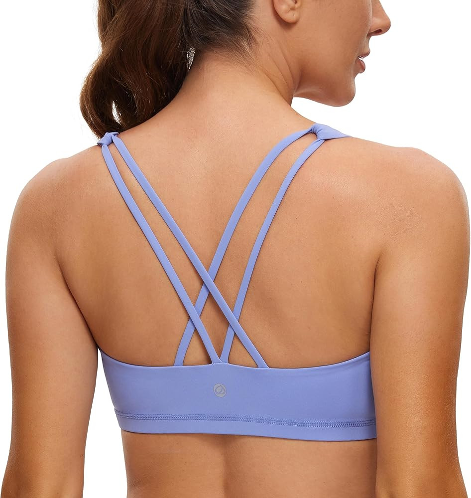 CRZ YOGA Women's Low Impact Strappy Sports Bra - Low Cut Wirefree Padded Yoga Bra Criss Cross Bac... | Amazon (US)