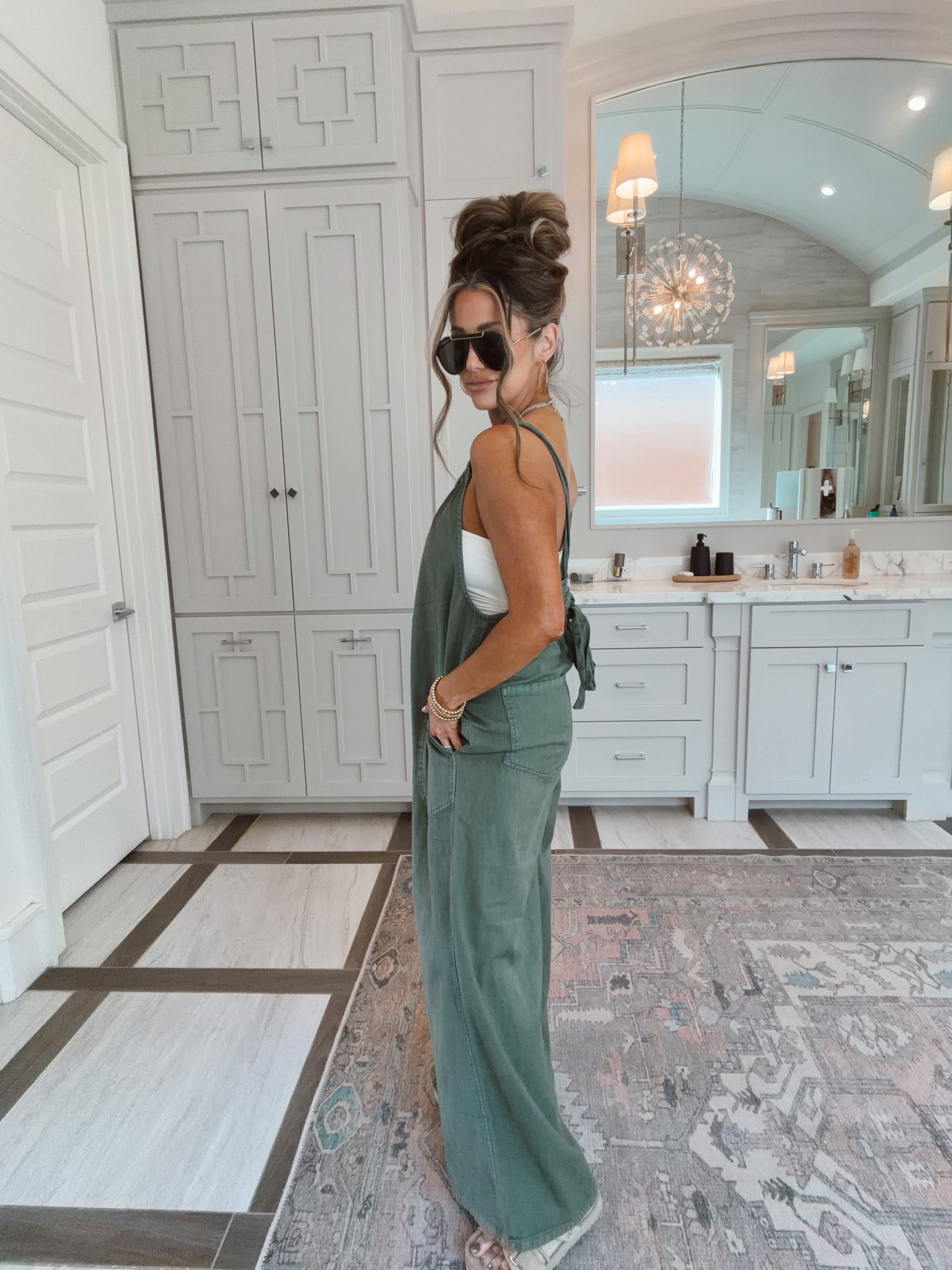 This jumpsuit is so comfy. I’m wearing a size small!

#LTKSeasonal #LTKmomlife #LTKootd