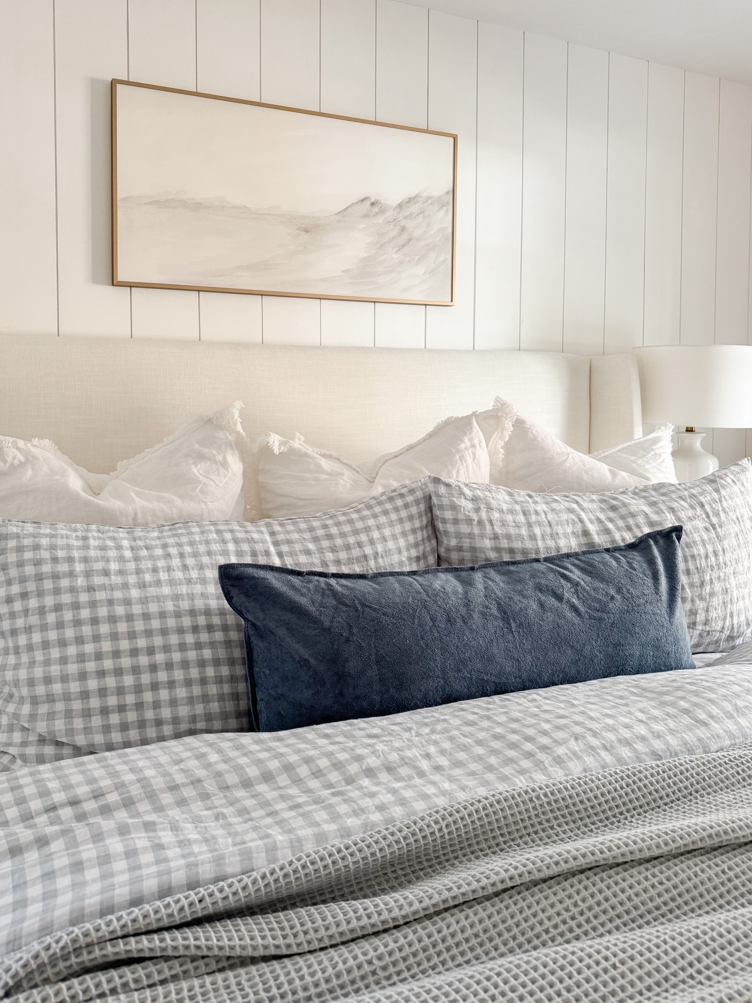 Layered coastal bedroom! This bedroom is all about relaxed layers, soft blues, and classic coastal patterns that make the space feel serene. 

#LTKHome