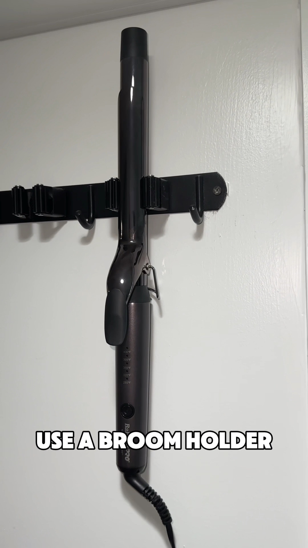 Hair Hack: Storage Edition ✨Here’s a quick and organized way to store your curling irons (cue the drum roll) with a broom holder—yes, you heard that right! 🧹 

No more tangled cords or searching for your fave tool. Grab, style, slay. 💁‍♀️ Let me know if you try this organizational hair hack. 💬

Featuring the limited edition BabyLiss Pro Nano Titanium Extended-Barrel Curling Iron, Nightfall Collection. 🌙 

It’s my go-to for curling long hair because of its extra 2 inch barrel + even heat distribution.

LTK 🔗 above to grab yours while they last! ✨

🤎 #omgartistry

#LTKBeauty #LTKVideo #LTKHome