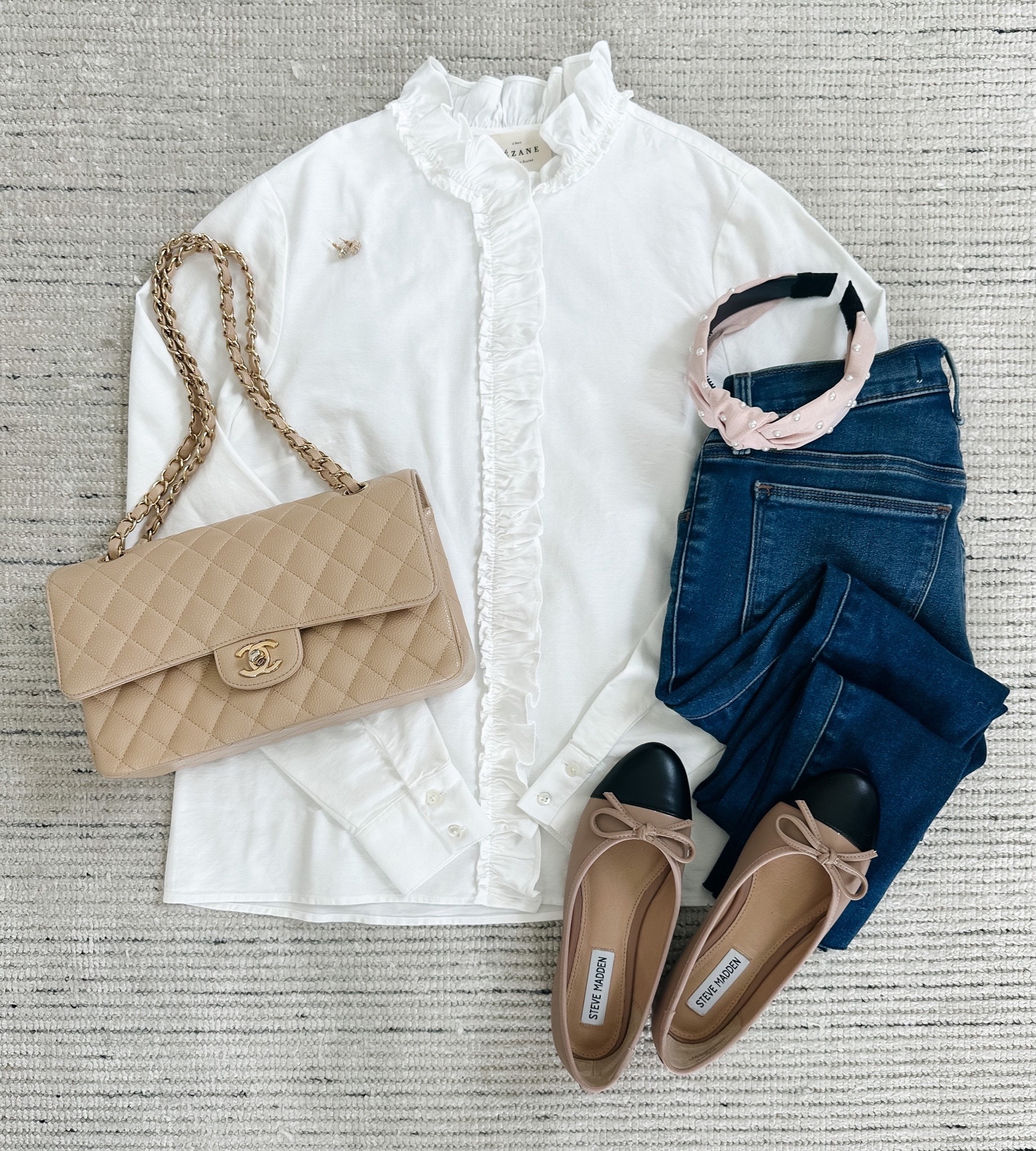 Early spring outfit with white ruffled blouse paired with dark wash denim and two toned flats for a chic look. Would be perfect casual workwear, spring outfits, date night and more 

#LTKSeasonal #LTKstyletip
