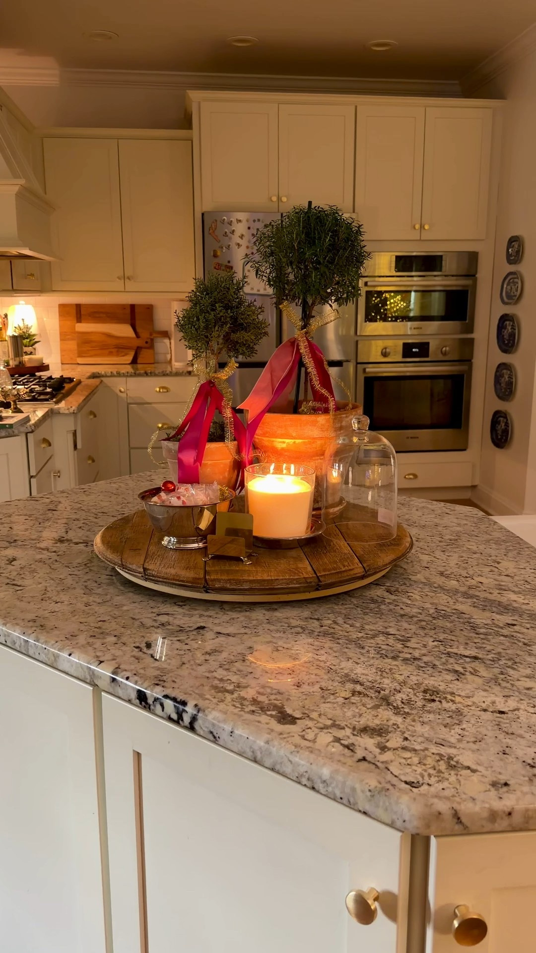 a little Christmas vignette 
Topiary tree 
My favorite target candle 

#LTKHoliday #LTKHome #LTKSeasonal